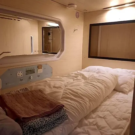 Wooden Box With Sleeping Amenities Vindegade 53e Capsulehotel Odense